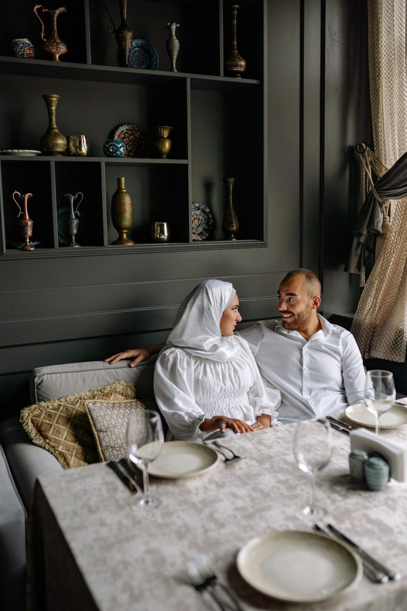 Couple at a table setting